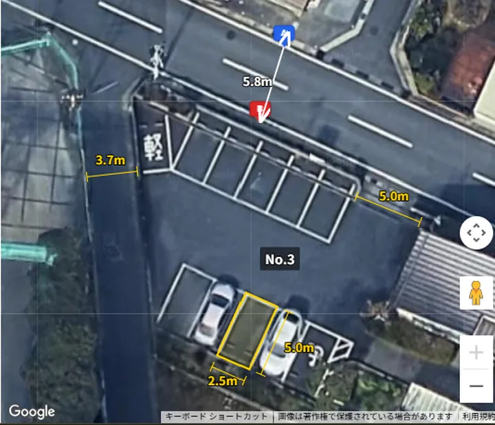 Garadioの配置図画面。航空写真の上で青と赤のピンを道路の両端に合わせて幅5.8mを測っている。黄色い車庫の矩形（No.3）には5.0m×2.5m、周辺の道路には3.7m・5.0mの寸法が表示されている。